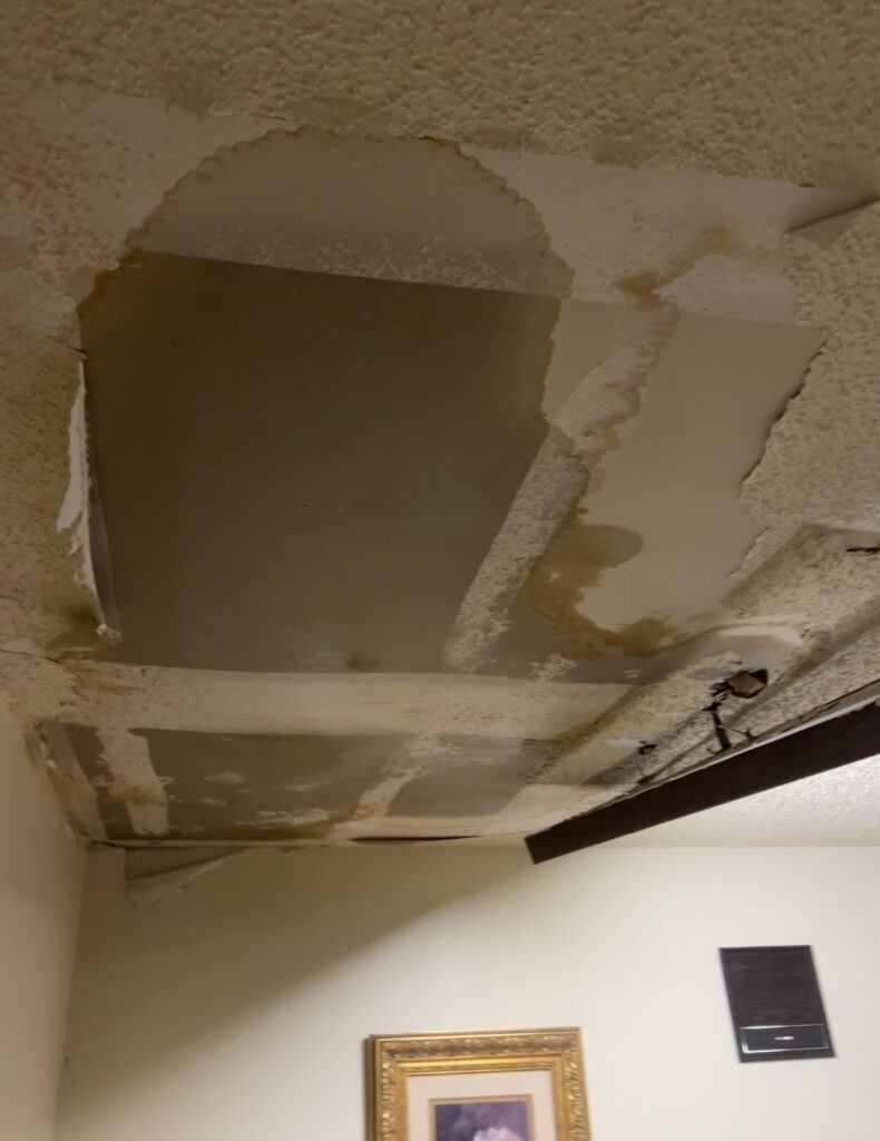 Ceiling collapsed from water damage in a San Antonio home